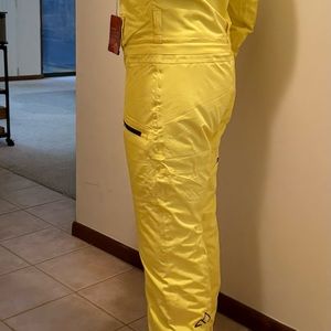 Women's ski suit, new with label never used. Med-Lrg European.